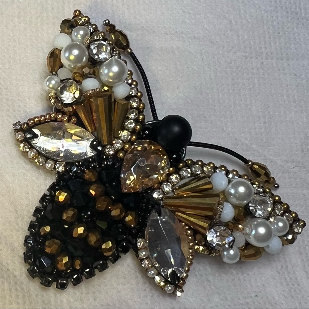 Elegant Black and Gold Butterfly Brooch